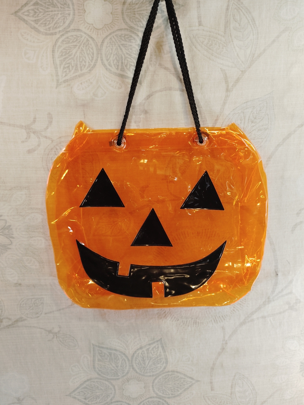Kids Plastic Orange Pumpkin Treat Tote with Black Jack-O'-Lantern Face